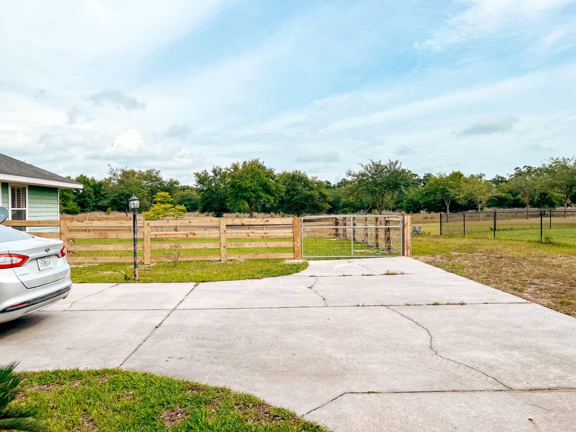Ranch & Crossbuck fence installed by Southern Fencing LLC