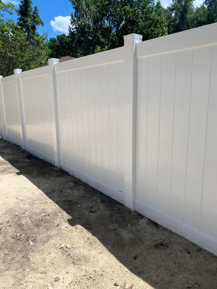 White Vinyl fence installed by Southern Fencing LLC